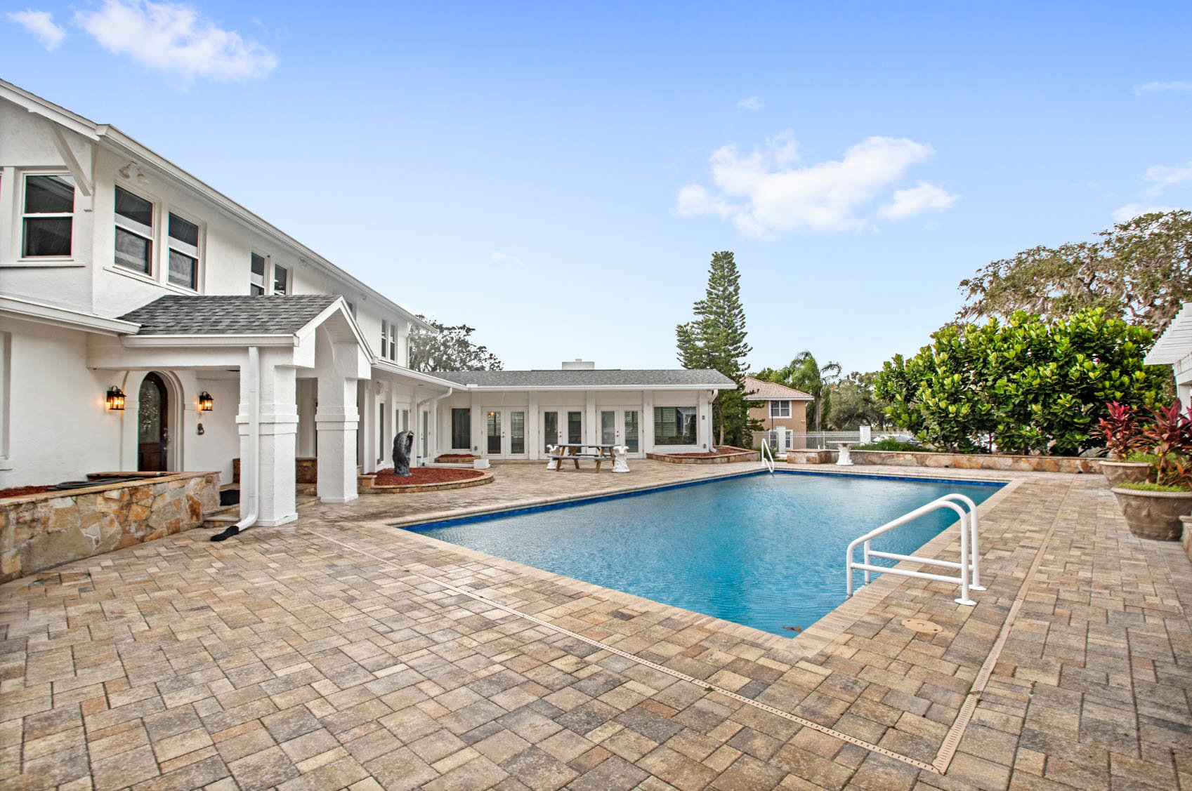 pool with deck off back of home